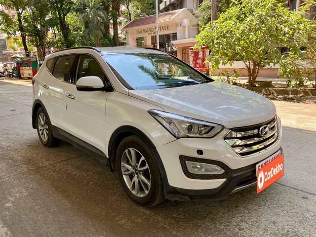 https://images10.gaadi.com/usedcar_image/3615786/original/processed_img2888685__usedcar_2015hyundaisantafeatcrdi4wdpic3_1201697026509_1697026532.jpg?imwidth=6400