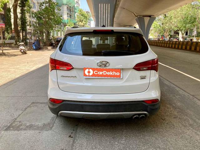 https://images10.gaadi.com/usedcar_image/3615786/original/processed_img2888685__usedcar_2015hyundaisantafeatcrdi4wdpic9_1201697026509_1697026532.jpg?imwidth=6402