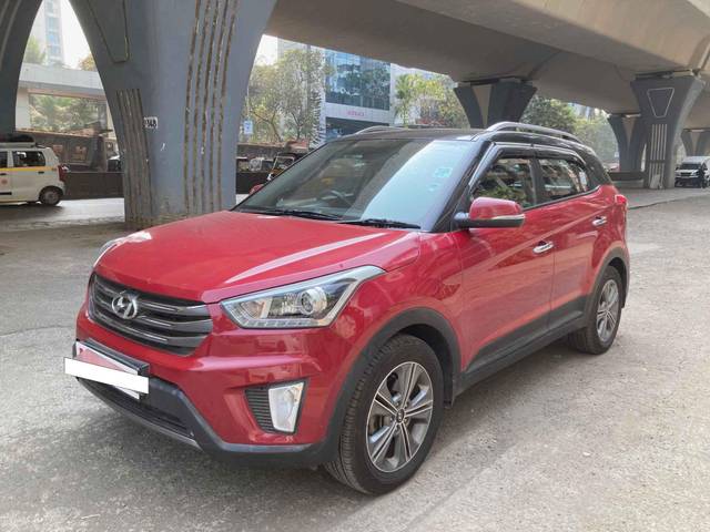 https://images10.gaadi.com/usedcar_image/3708734/original/processed_img2930743__usedcar_2017hyundaicreta16vtvtautosx_redpic3_1201702039837_1702039861.jpg?imwidth=6400