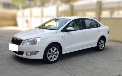 Skoda Rapid 1.6 MPI Ambition Plus Second-hand 2014 Skoda Rapid 1.6 MPI Ambition Plus for sale in Pune