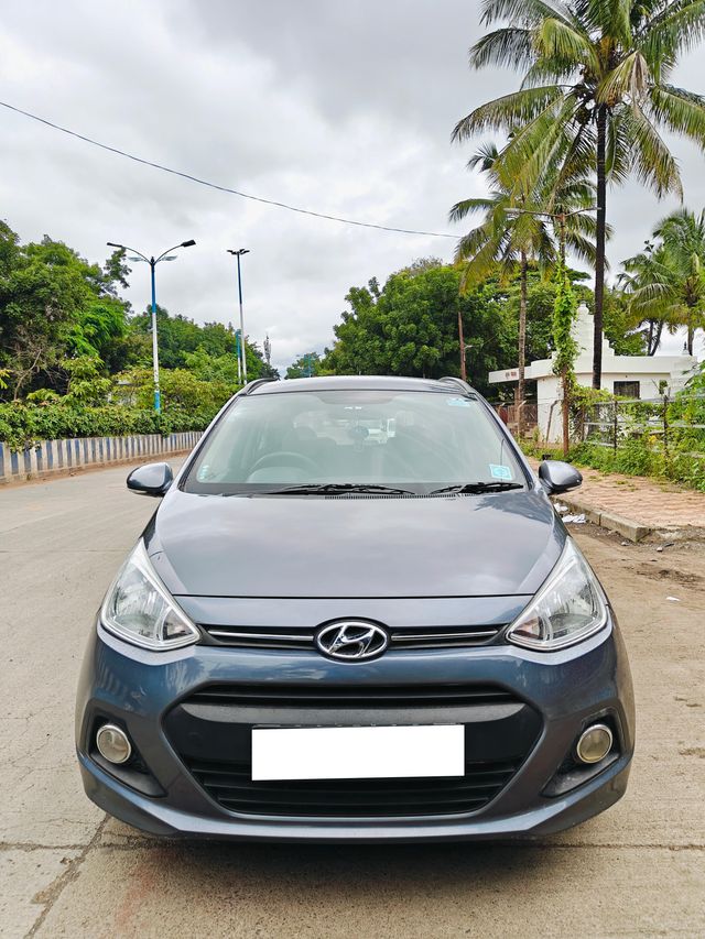 Second-hand 2014 Hyundai Grand i10 Sportz for sale in Pune