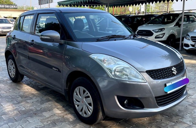 Second-hand 2014 Maruti Swift VXI for sale in Ahmedabad