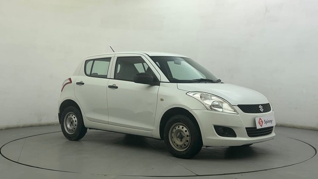 Second-hand 2013 Maruti Swift LXi for sale in Ahmedabad-1