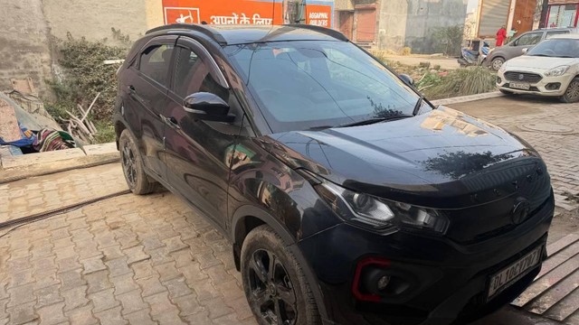 Second-hand 2023 Tata Nexon XZA Plus LUXS Red Dark AMT for sale in New Delhi-5