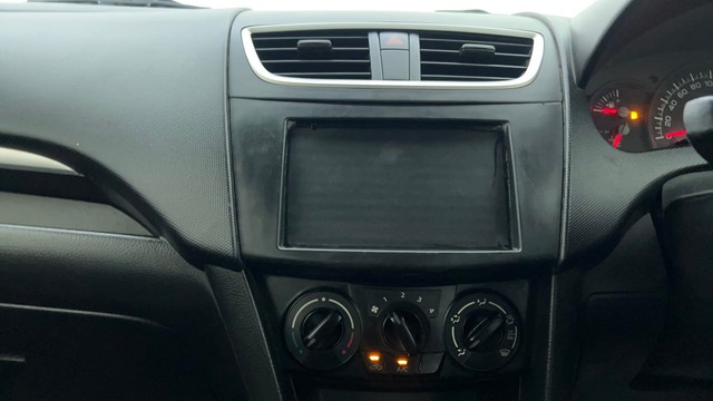 Second-hand 2015 Maruti Swift LXI Option for sale in Ahmedabad-38