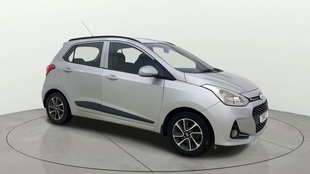 Second-hand 2018 Hyundai Grand i10 1.2 Kappa Sportz Option AT for sale in Ahmedabad
