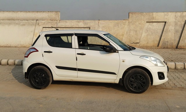 Second-hand 2017 Maruti Suzuki Swift LXI Optional-O for sale in Faridabad-1