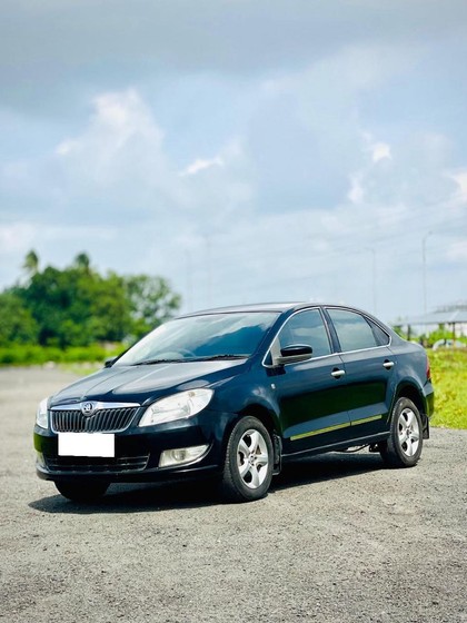 Second-hand 2015 Skoda Rapid 1.5 TDI Ambition for sale in Surat