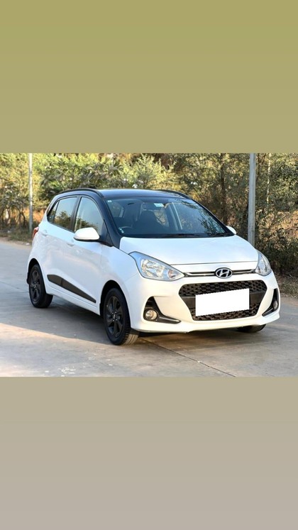 Second-hand 2018 Hyundai Grand i10 1.2 Kappa Sportz Dual Tone for sale in Ahmedabad