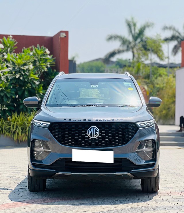 Second-hand 2021 MG Hector Plus Sharp Diesel MT for sale in Surat-0