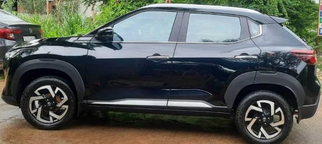 Nissan Magnite Kuro MT Second-hand 2023 Nissan Magnite Kuro MT for sale in Anand