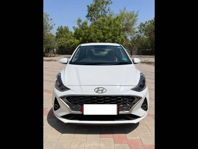 Hyundai Aura SX Plus AMT Second-hand 2021 Hyundai Aura SX Plus AMT for sale in Ahmedabad
