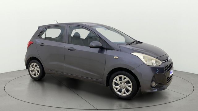 Hyundai Grand i10 1.2 Kappa Magna AT Second-hand 2018 Hyundai Grand i10 1.2 Kappa Magna AT for sale in Ahmedabad