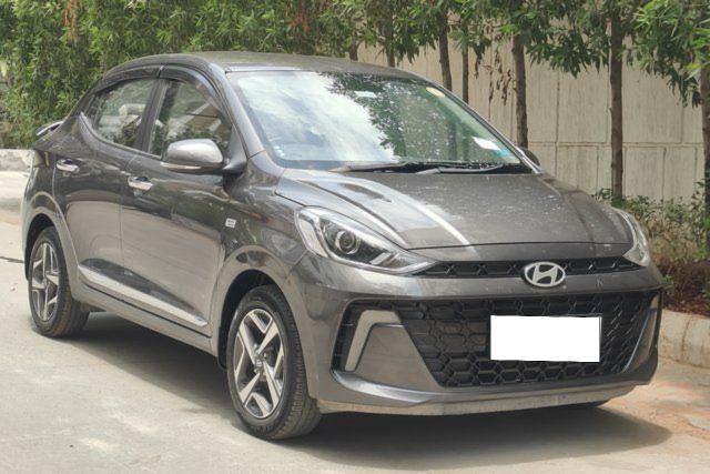 Second-hand 2023 Hyundai Aura SX Plus AMT BSVI for sale in Hyderabad