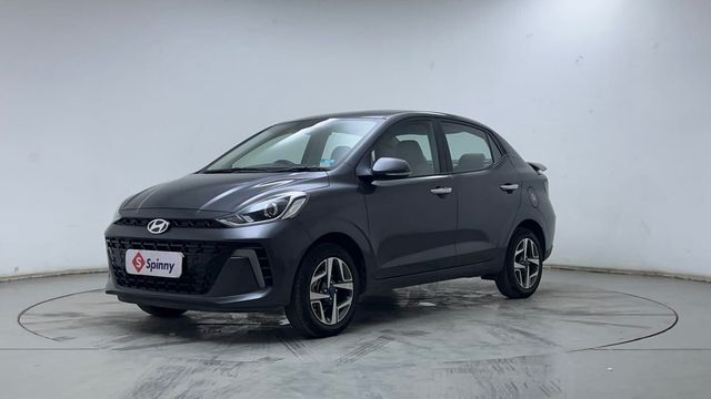 Second-hand 2024 Hyundai Aura SX Plus AMT Diesel for sale in Hyderabad