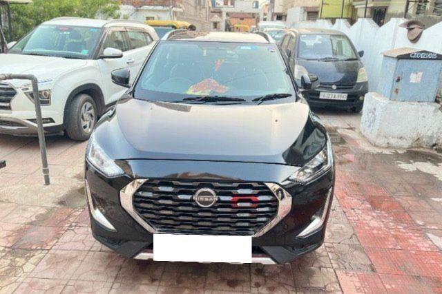 Nissan Magnite Kuro MT Second-hand 2023 Nissan Magnite Kuro MT for sale in Ahmedabad