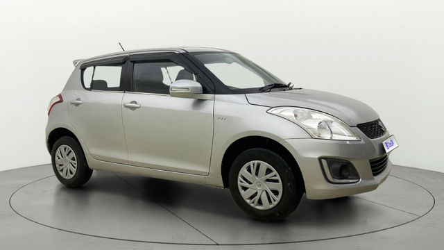 Maruti Suzuki Swift VXI Second-hand 2014 Maruti Suzuki Swift VXI for sale in Ahmedabad
