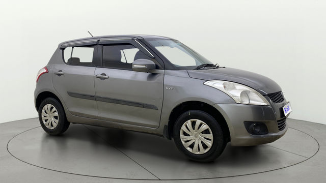 Maruti Suzuki Swift VXI Second-hand 2014 Maruti Suzuki Swift VXI for sale in Ahmedabad