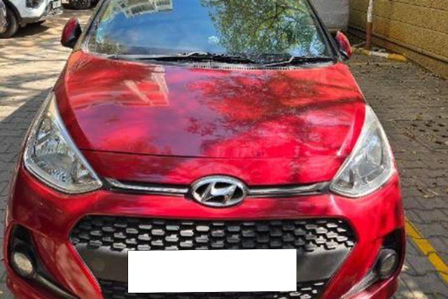 Second-hand 2018 Hyundai Grand i10 1.2 Kappa Sportz Dual Tone for sale in Pune