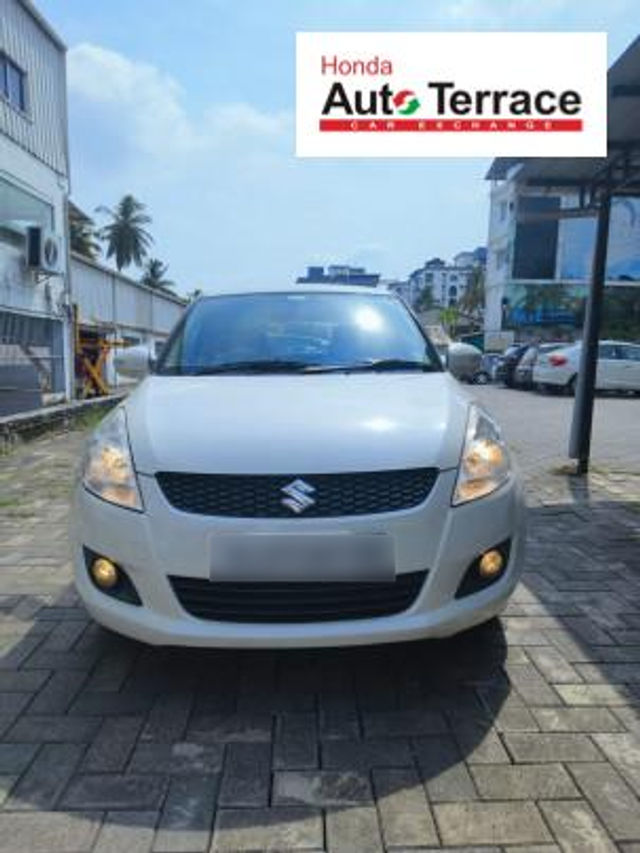 Second-hand 2014 Maruti Suzuki Swift वीएक्सआई for sale in Kochi