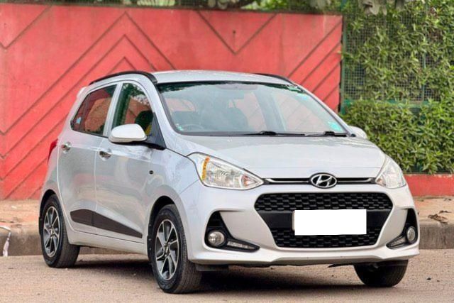 Hyundai Grand i10 1.2 Kappa Asta Second-hand 2018 Hyundai Grand i10 1.2 Kappa Asta for sale in Surat