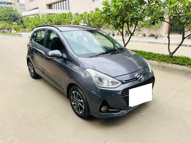 Hyundai Grand i10 1.2 Kappa Sportz Option AT Second-hand 2018 Hyundai Grand i10 1.2 Kappa Sportz Option AT for sale in Ahmedabad
