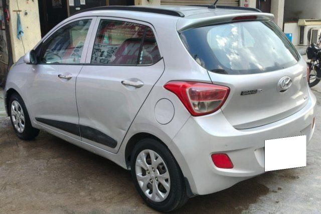 Second-hand 2014 Hyundai Grand i10 Sportz for sale in Ahmedabad