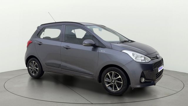 Hyundai Grand i10 1.2 कप्पा स्पोर्टज़ ऑप्शन AT Second-hand 2018 Hyundai Grand i10 1.2 कप्पा स्पोर्टज़ ऑप्शन AT for sale in Ahmedabad