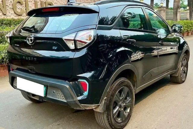Second-hand 2023 Tata Nexon EV Empowered प्लस 45 लाल Dark for sale in Thane