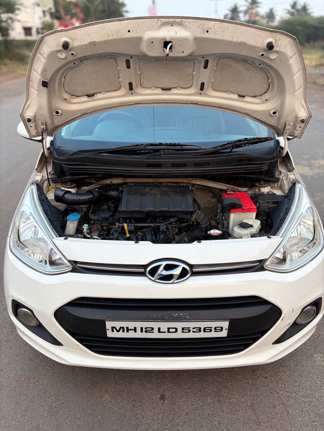 Second-hand 2014 Hyundai Grand i10 Magna for sale in Miraj-4