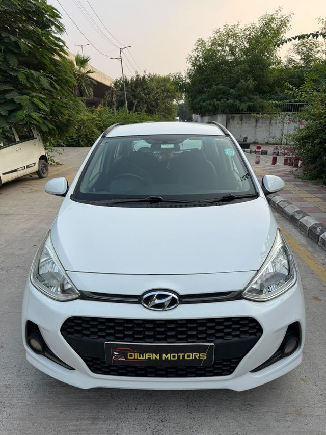 Hyundai Grand i10 1.2 Kappa Sportz Option AT Second-hand 2018 Hyundai Grand i10 1.2 Kappa Sportz Option AT for sale in New Delhi